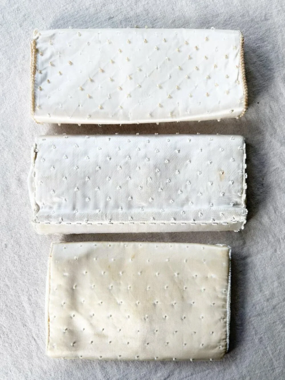 Three 1950's Vintage Ivory Satin and Beaded Pearl Clutch Purses